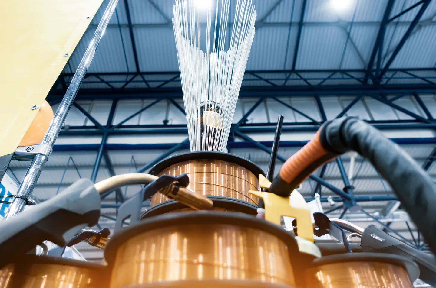 Copper wire spools on a wire-drawing machine